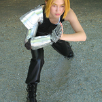 Edward Elric strikes a pose with his automail